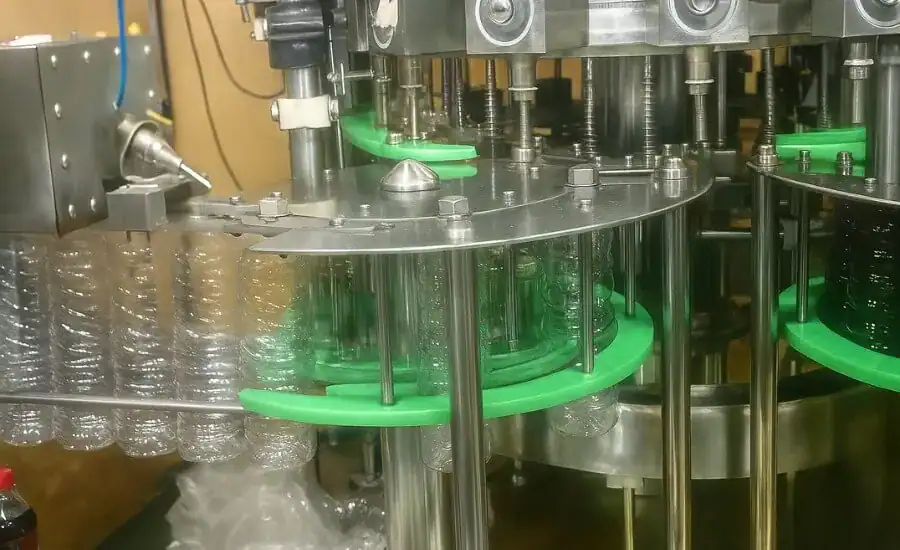PET Bottle 12 Head Rotary Filler Capper Monoblock – detail view
